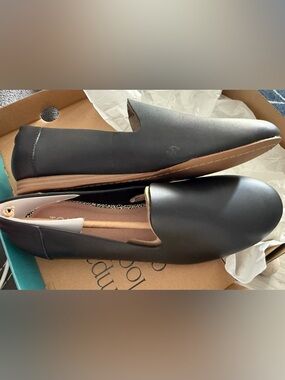 TOMS Black Slip-On Loafers with Gold Accent